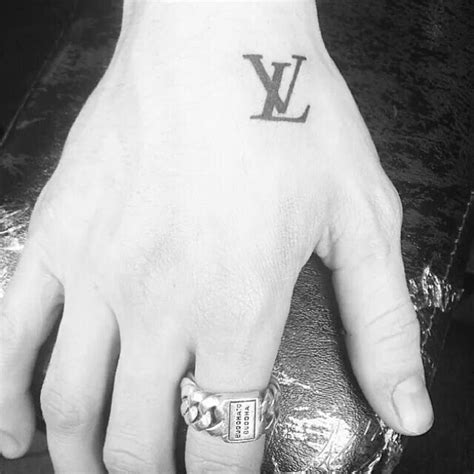Lv tattoo - 5 days ago · The meaning of the tattoo is actually broken up into two parts: 14 and 88. 14 refers to the “Fourteen Words”—a quote by Nazi leader David Lane, while 88 refers to H, the eighth letter of the alphabet. So, essentially, 88 stands for HH, or “Heil Hitler.” These tattoos can be associated with the Aryan Brotherhood, a white gang of Neo-Nazis. 